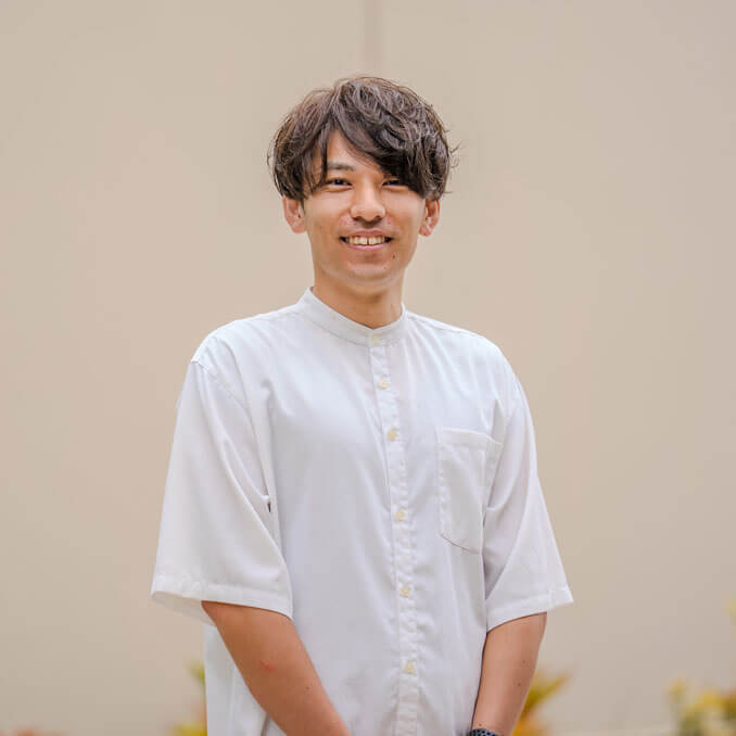 吉岡 純コーチの顔写真